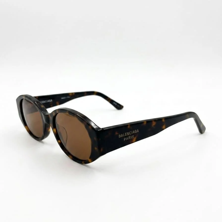 Balenciaga Eyewear Sunglasses With An Oval Frame And Tortoiseshell Effect - Image 2