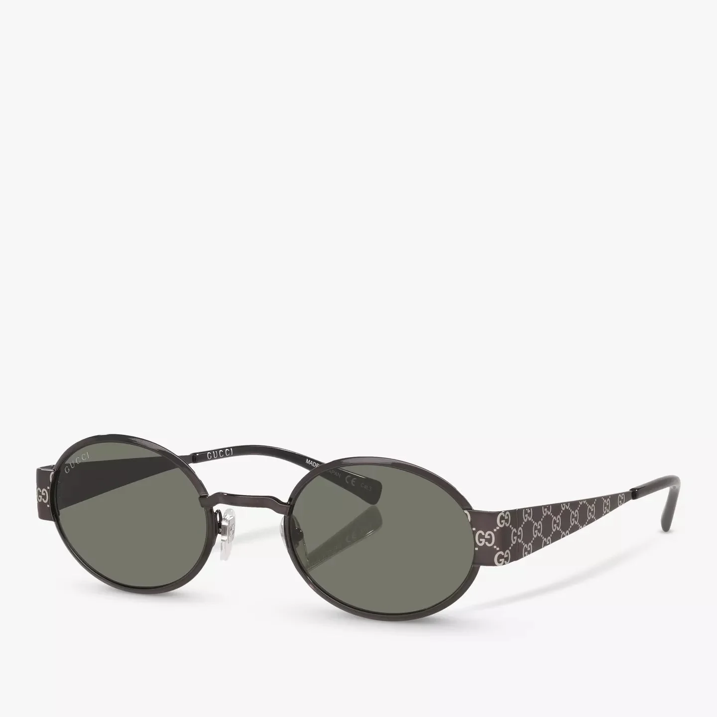Gucci Oval Sunglasses With GG Monogram Temples